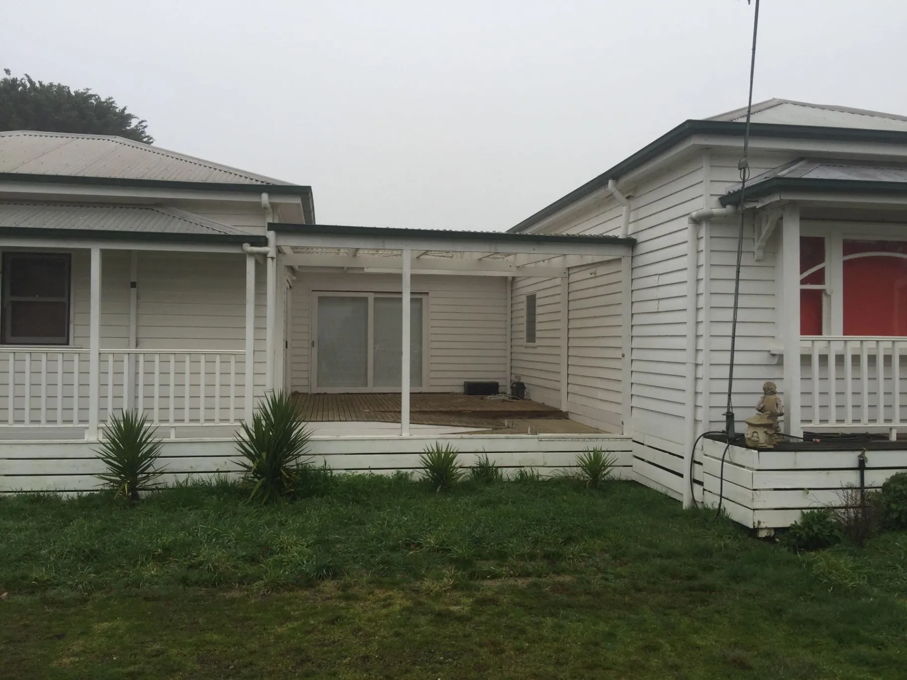 Kyneton weatherboard home and covered rear deck before the renovation